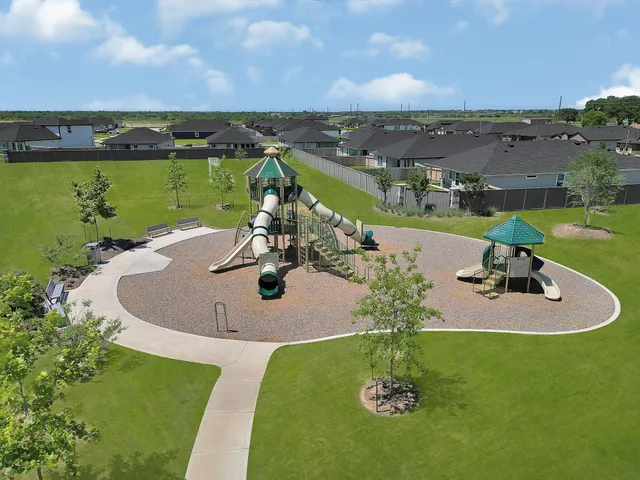 a view of a lake with a yard