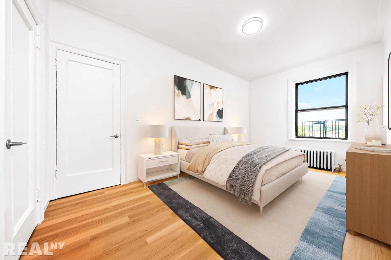 690 Riverside Drive, Unit 6D Manhattan, NY 10031 - Photo 3 of 7 a bedroom with a bed and a window