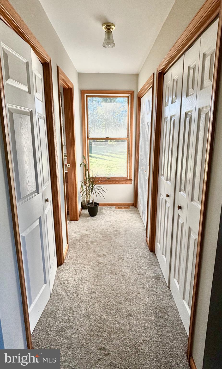 908 Priestford Road Darlington, MD 21034 - Photo 32 of 65 UPPER LEVEL HALLWAY WITH LAUNDRY CLOSET