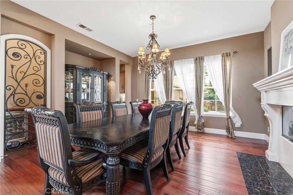 4463 Cardinal Cushing Claremont, CA 91711 - Photo 14 of 75 a view of a a dining room with furniture window and wooden floor