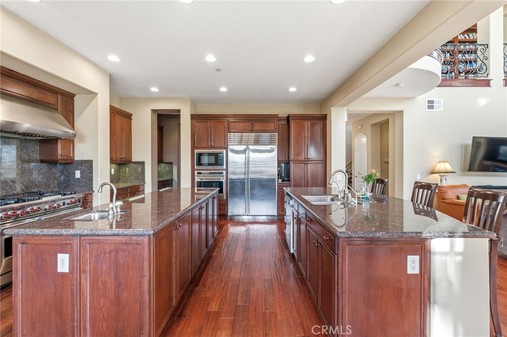4463 Cardinal Cushing Claremont, CA 91711 - Photo 20 of 75 a kitchen with counter top space a sink appliances and cabinets
