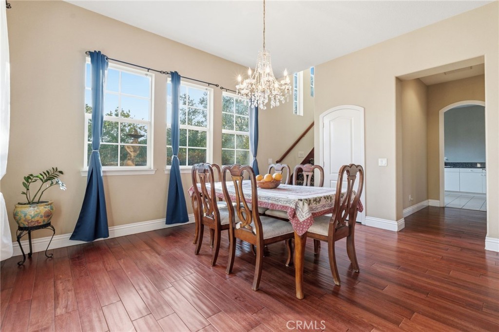 4463 Cardinal Cushing Claremont, CA 91711 - Photo 23 of 75 a view of a dining room with furniture window and wooden floor