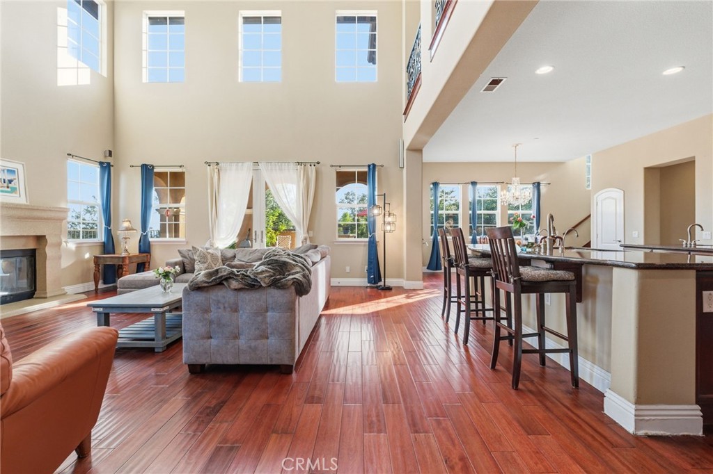 4463 Cardinal Cushing Claremont, CA 91711 - Photo 24 of 75 a living room with furniture and a wooden floor