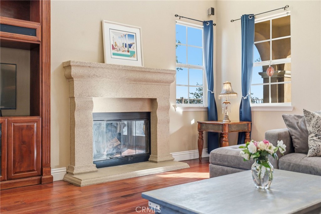 4463 Cardinal Cushing Claremont, CA 91711 - Photo 27 of 75 a living room with furniture and a fireplace