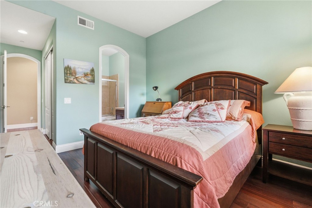 4463 Cardinal Cushing Claremont, CA 91711 - Photo 31 of 75 a bedroom with a bed and a mirror