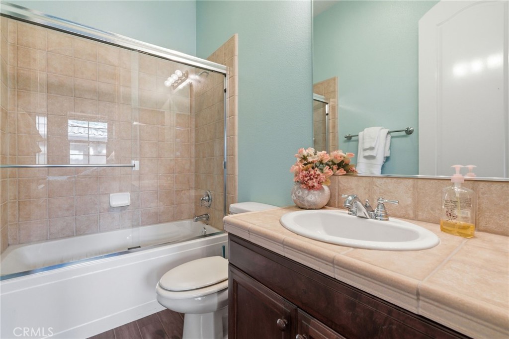 4463 Cardinal Cushing Claremont, CA 91711 - Photo 32 of 75 a bathroom with a sink a toilet and shower