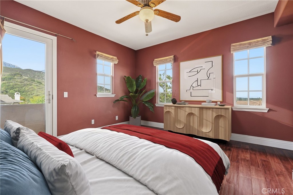 4463 Cardinal Cushing Claremont, CA 91711 - Photo 40 of 75 a bedroom with a large bed and a window