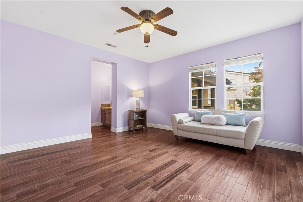 4463 Cardinal Cushing Claremont, CA 91711 - Photo 44 of 75 a living room with furniture and a wooden floor