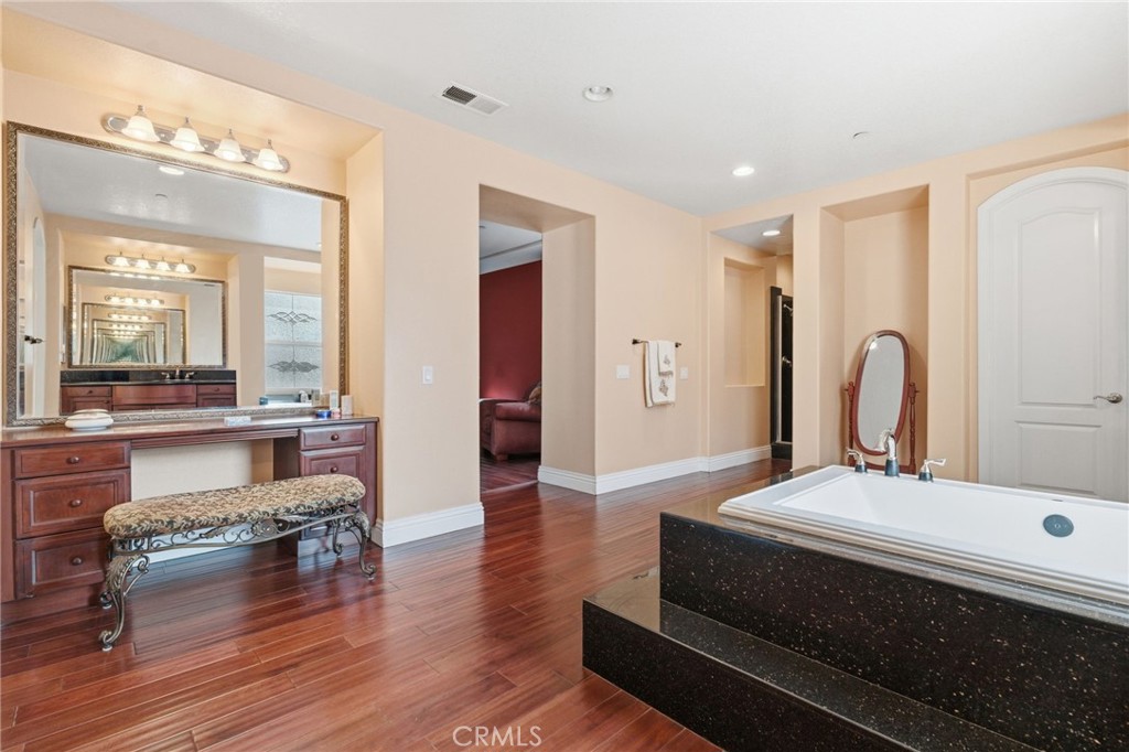 4463 Cardinal Cushing Claremont, CA 91711 - Photo 60 of 75 a living room with furniture and a large mirror