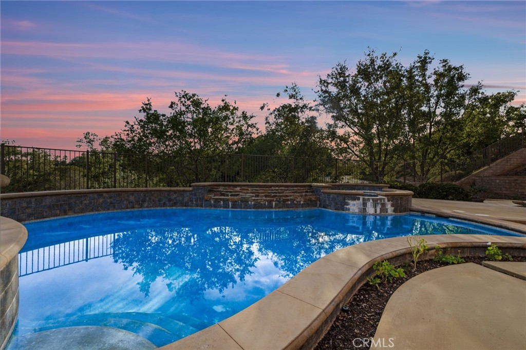 4463 Cardinal Cushing Claremont, CA 91711 - Photo 63 of 75 a view of a swimming pool with a patio