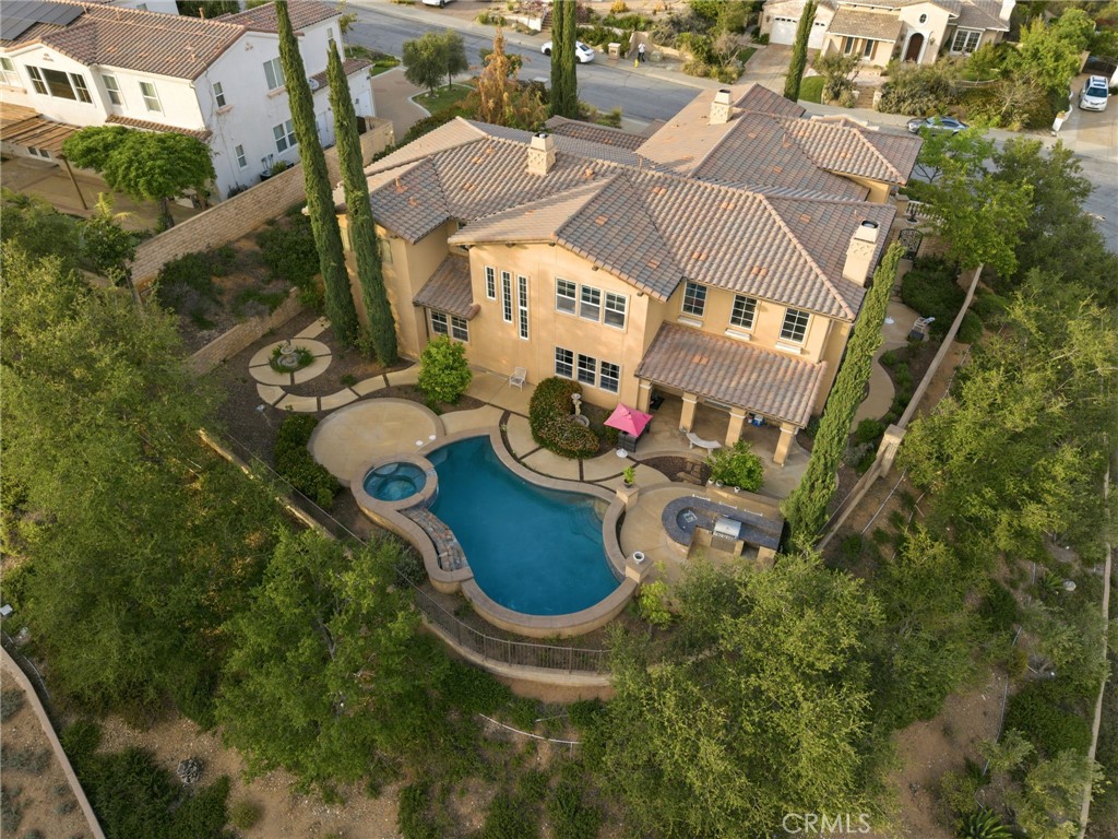 4463 Cardinal Cushing Claremont, CA 91711 - Photo 69 of 75 an aerial view of a house with garden space and street view