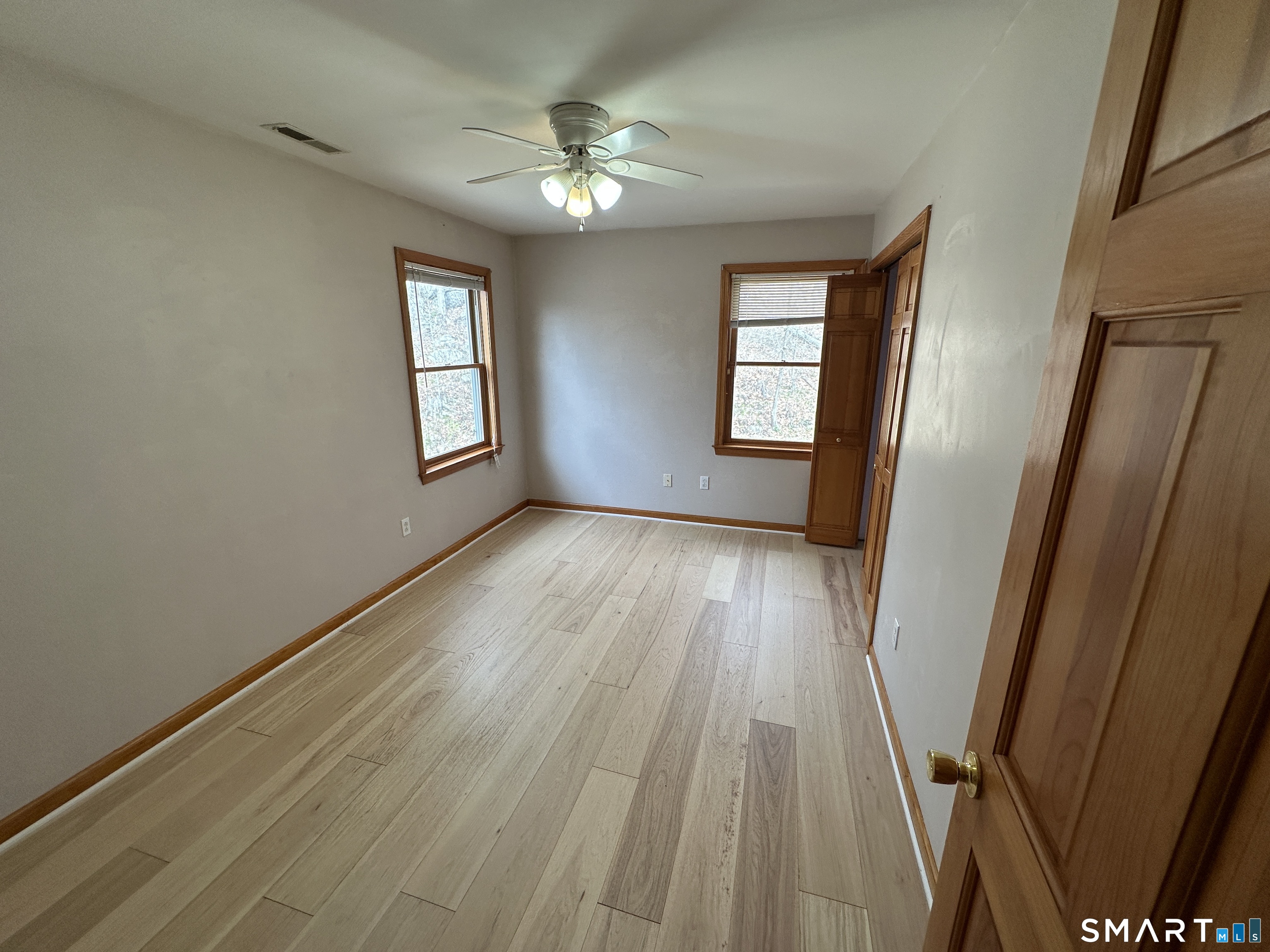 181 North Chestnut Hill Road Killingworth, CT 06419 - Photo 24 of 26 a view of a room with wooden floors and window