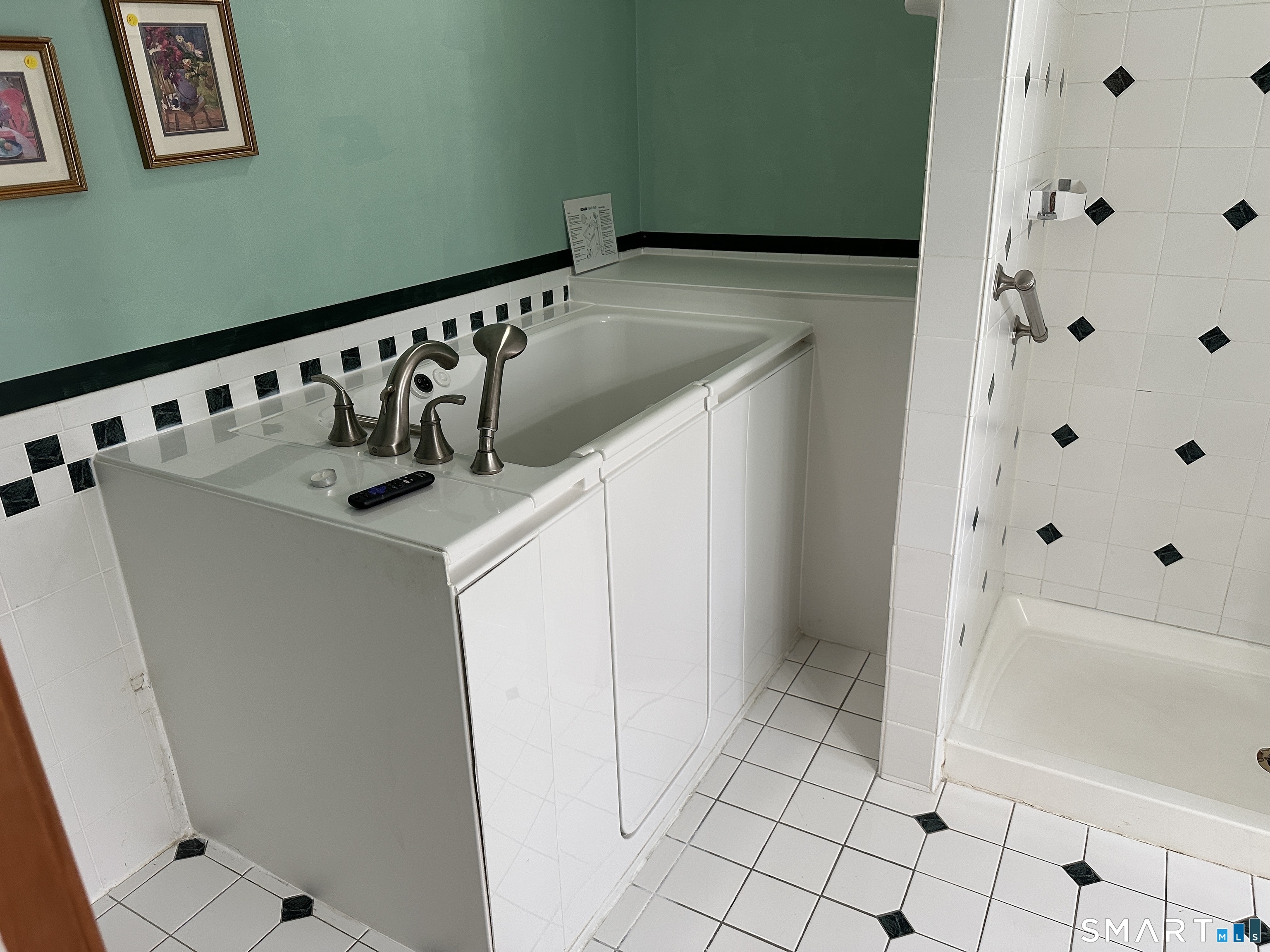 181 North Chestnut Hill Road Killingworth, CT 06419 - Photo 7 of 26 a view of a bathroom with a sink and a shower