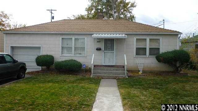 1240 Curti Drive Reno, NV 89502 - Photo 1 of 1 a front view of a house with garden