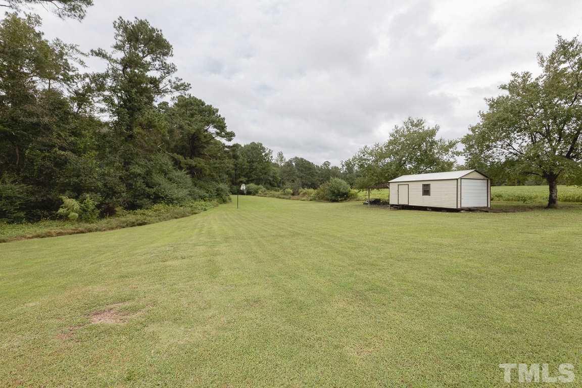 716 Sheriff Johnson Road Coats, NC 27521 - Photo 25 of 25 a picture of a field with an outdoor space