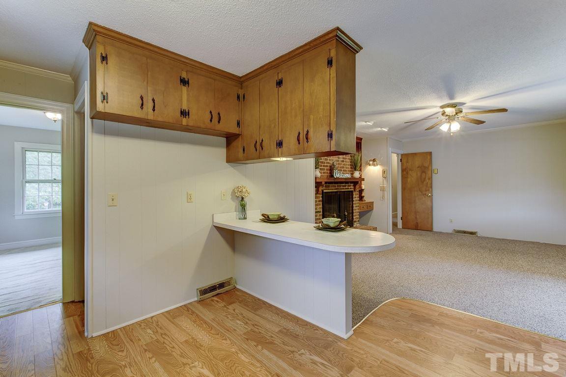 716 Sheriff Johnson Road Coats, NC 27521 - Photo 6 of 25 a view of a kitchen with electric appliances