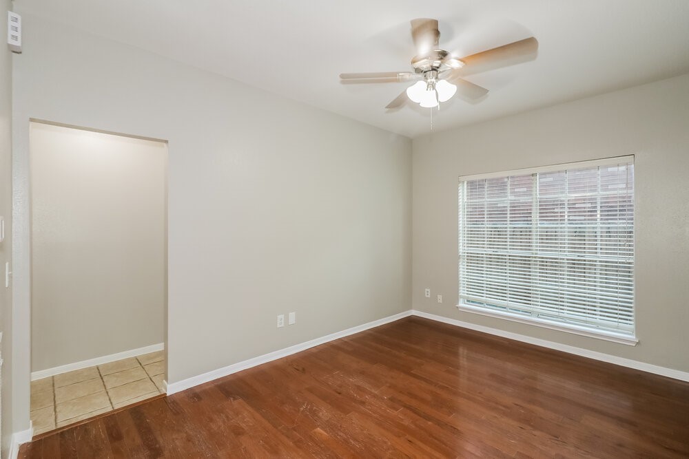 9423 Bayou Bluff Drive Spring, TX 77379 - Photo 6 of 16 a view of an empty room with a window