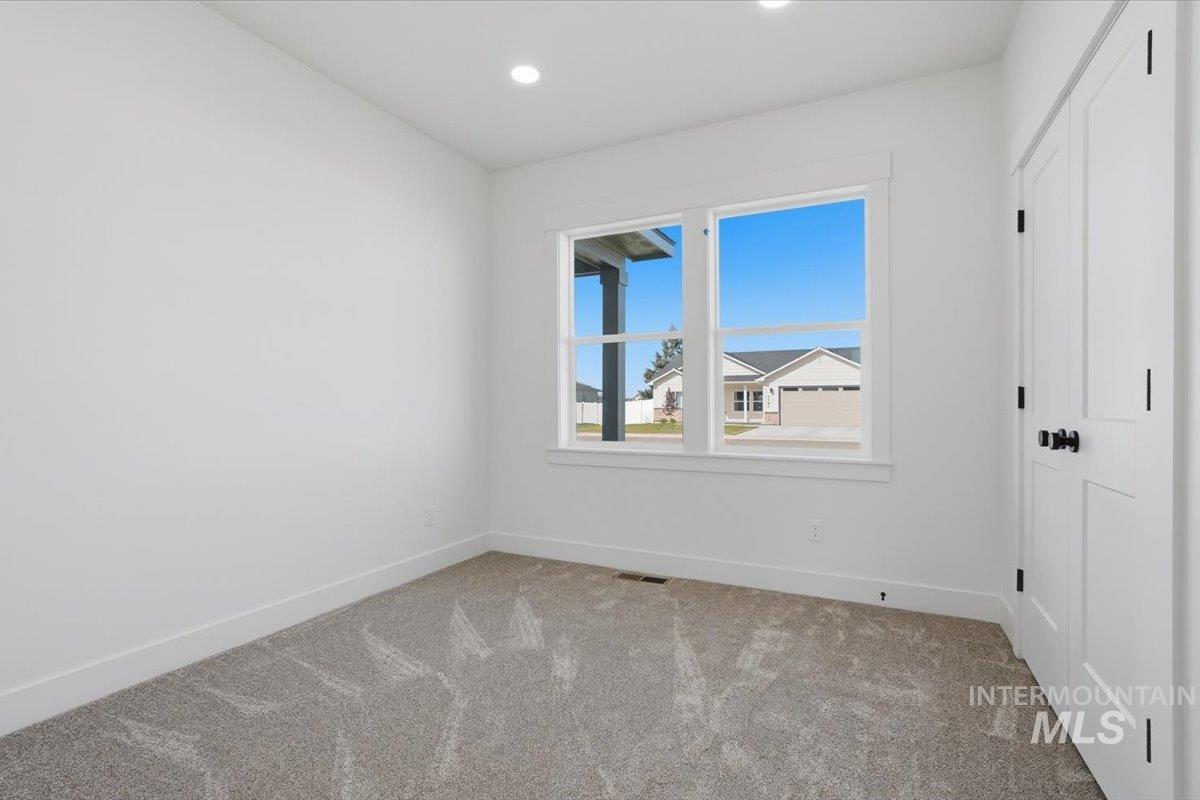 2175 Austin Way Fruitland, ID 83619 - Photo 19 of 30 Unfurnished bedroom with carpet floors and recessed lighting