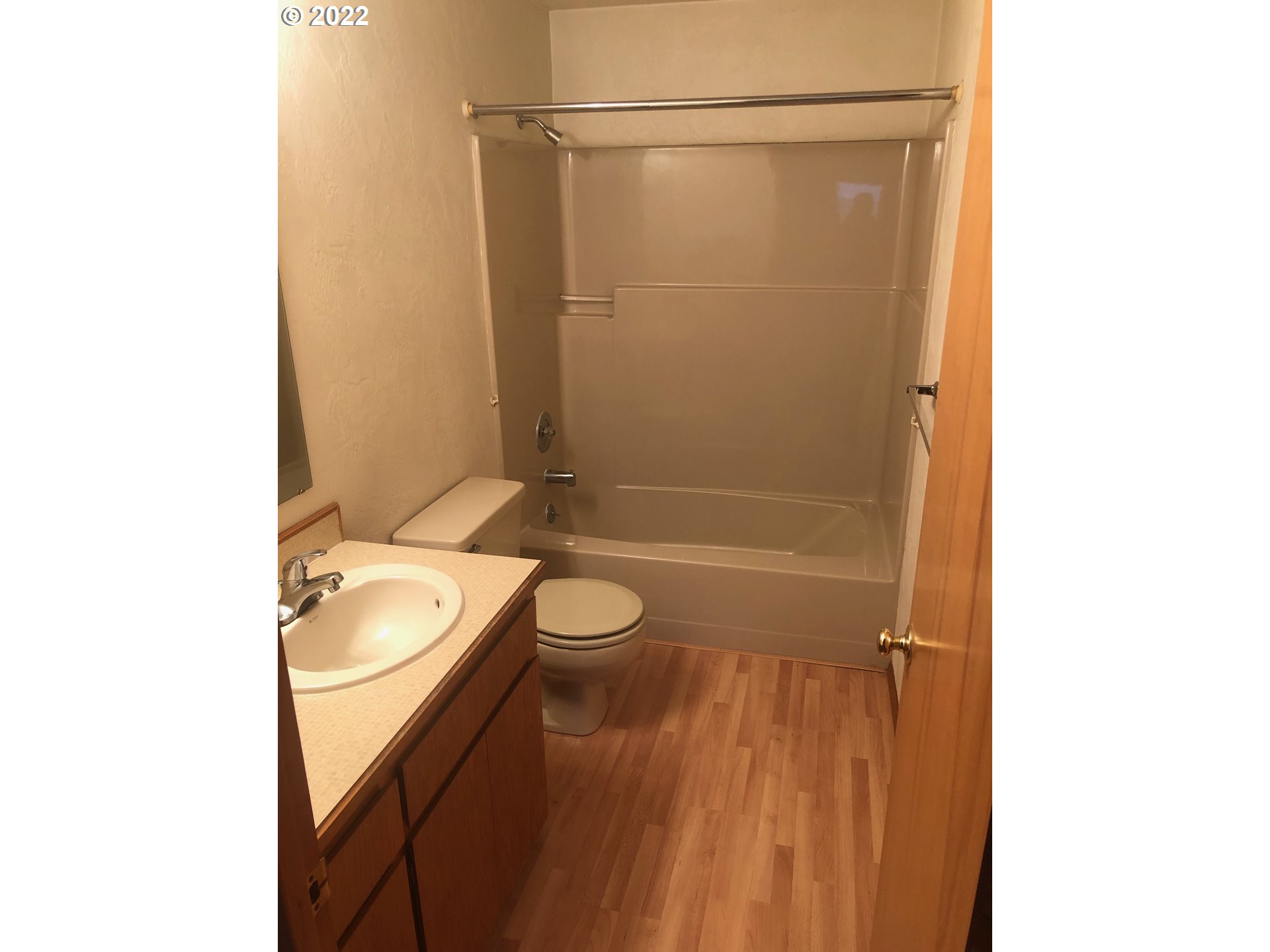 1190 South 44th Street Springfield, OR 97478 - Photo 9 of 9 a bathroom with a granite countertop sink toilet and shower