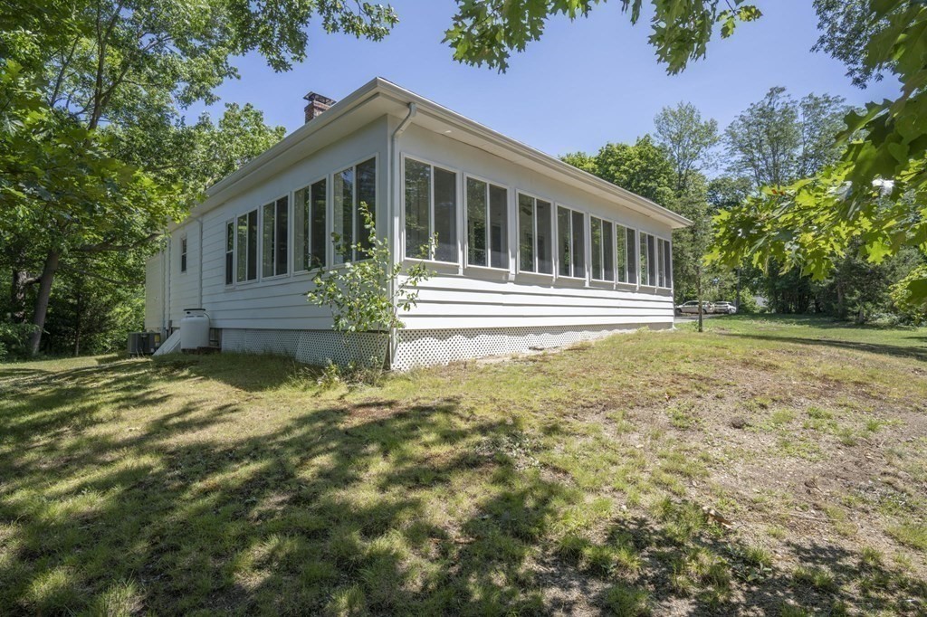 10 R Poquanticut Avenue Easton, MA 02375 - Photo 17 of 38 a front view of house with yard