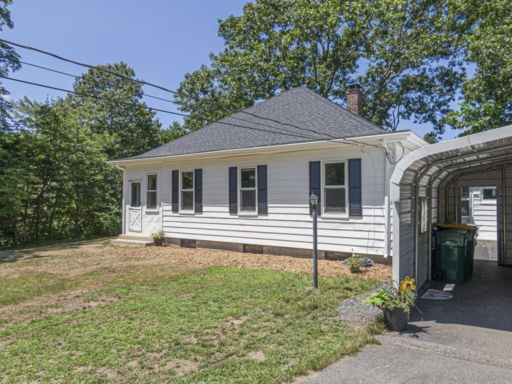 10 R Poquanticut Avenue Easton, MA 02375 - Photo 19 of 38 a backyard of a house with seating space