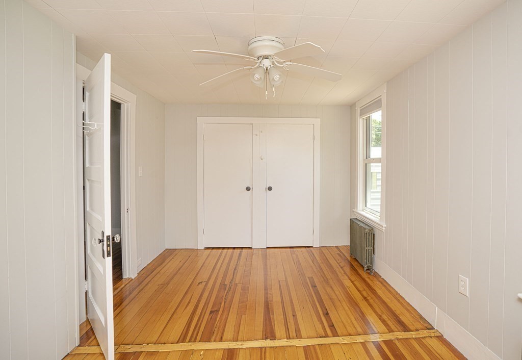 10 R Poquanticut Avenue Easton, MA 02375 - Photo 28 of 38 a view of a room with wooden floor and white walls