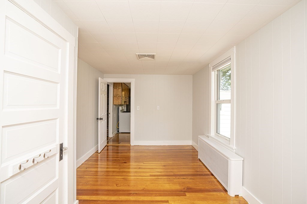 10 R Poquanticut Avenue Easton, MA 02375 - Photo 30 of 38 a view of a room with wooden floor and windows