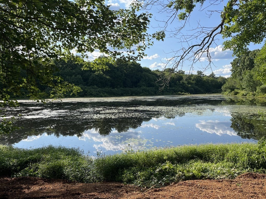 10 R Poquanticut Avenue Easton, MA 02375 - Photo 3 of 38 a view of a lake from a yard