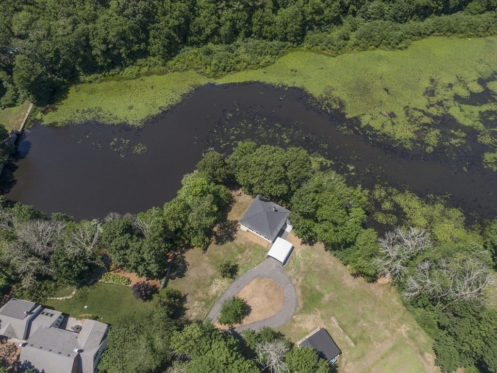 10 R Poquanticut Avenue Easton, MA 02375 - Photo 6 of 38 an aerial view of a house with a yard and lake view