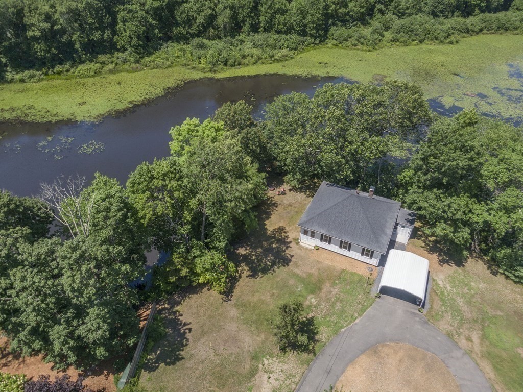 10 R Poquanticut Avenue Easton, MA 02375 - Photo 7 of 38 an aerial view of a house with a yard and lake view