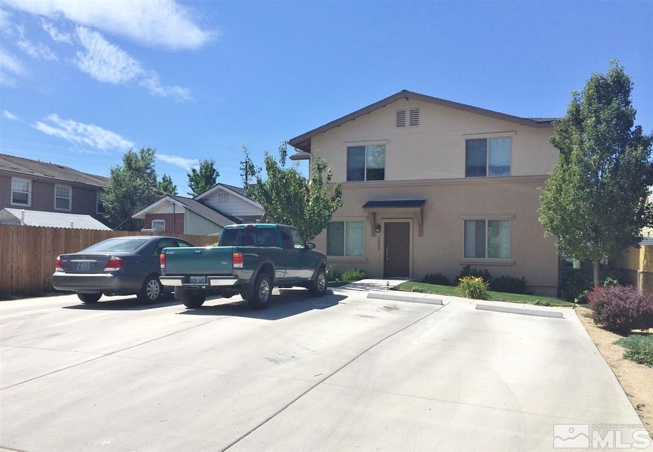 1052 Watt Street Reno, NV 89509 - Photo 2 of 25 a car parked in front of a house