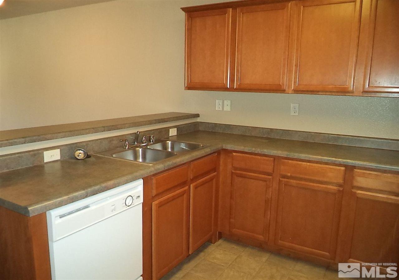 1052 Watt Street Reno, NV 89509 - Photo 24 of 25 a kitchen with a sink and cabinets