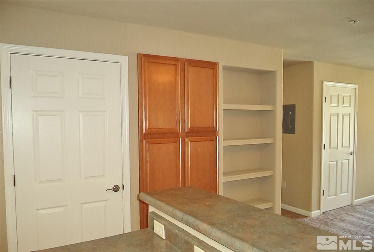 1052 Watt Street Reno, NV 89509 - Photo 5 of 25 a view of walk in closet with empty racks