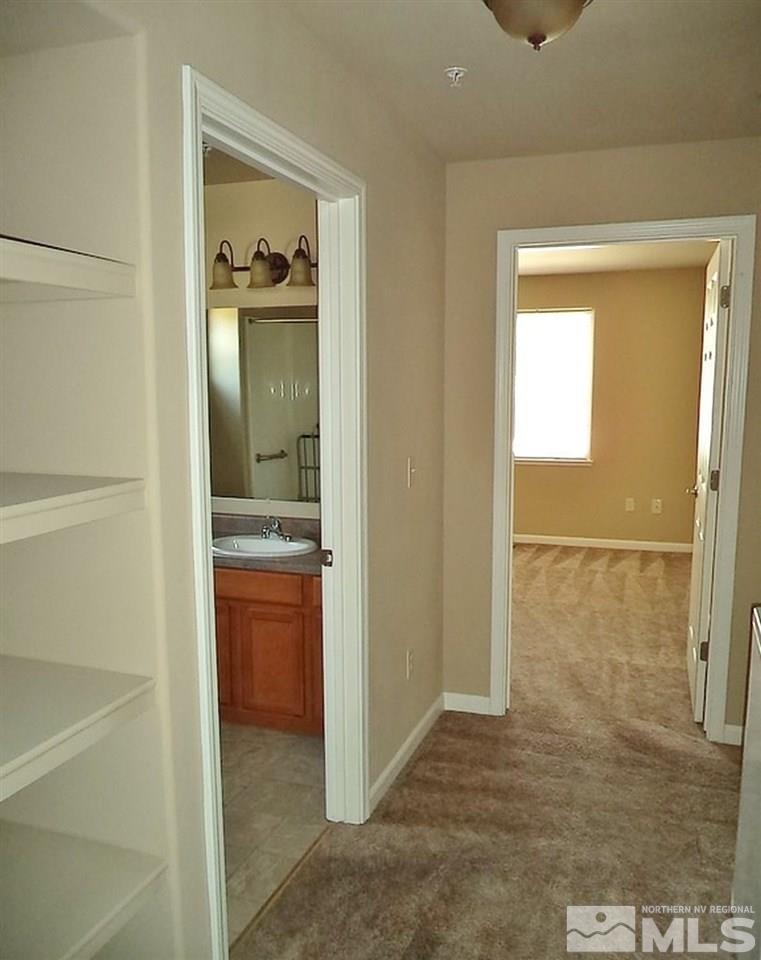 1052 Watt Street Reno, NV 89509 - Photo 10 of 25 a bathroom with a shower and a sink