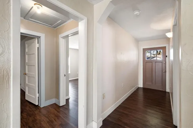 a white bath tub sitting next to a white sink