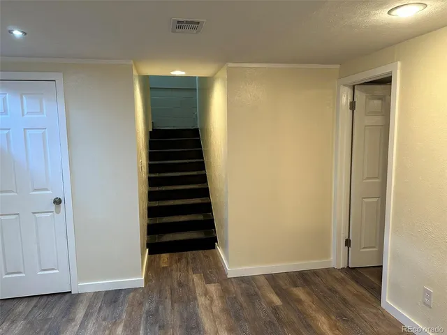 a view of entryway with wooden floor