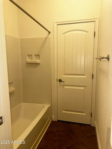 a view of a bathroom with a glass door
