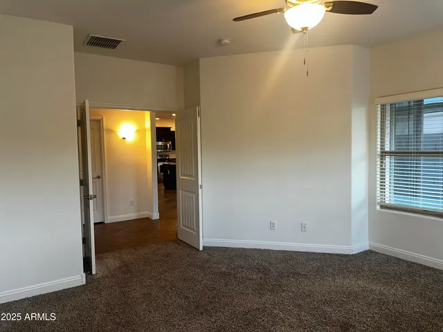 a bathroom with a shower sink vanity and mirror