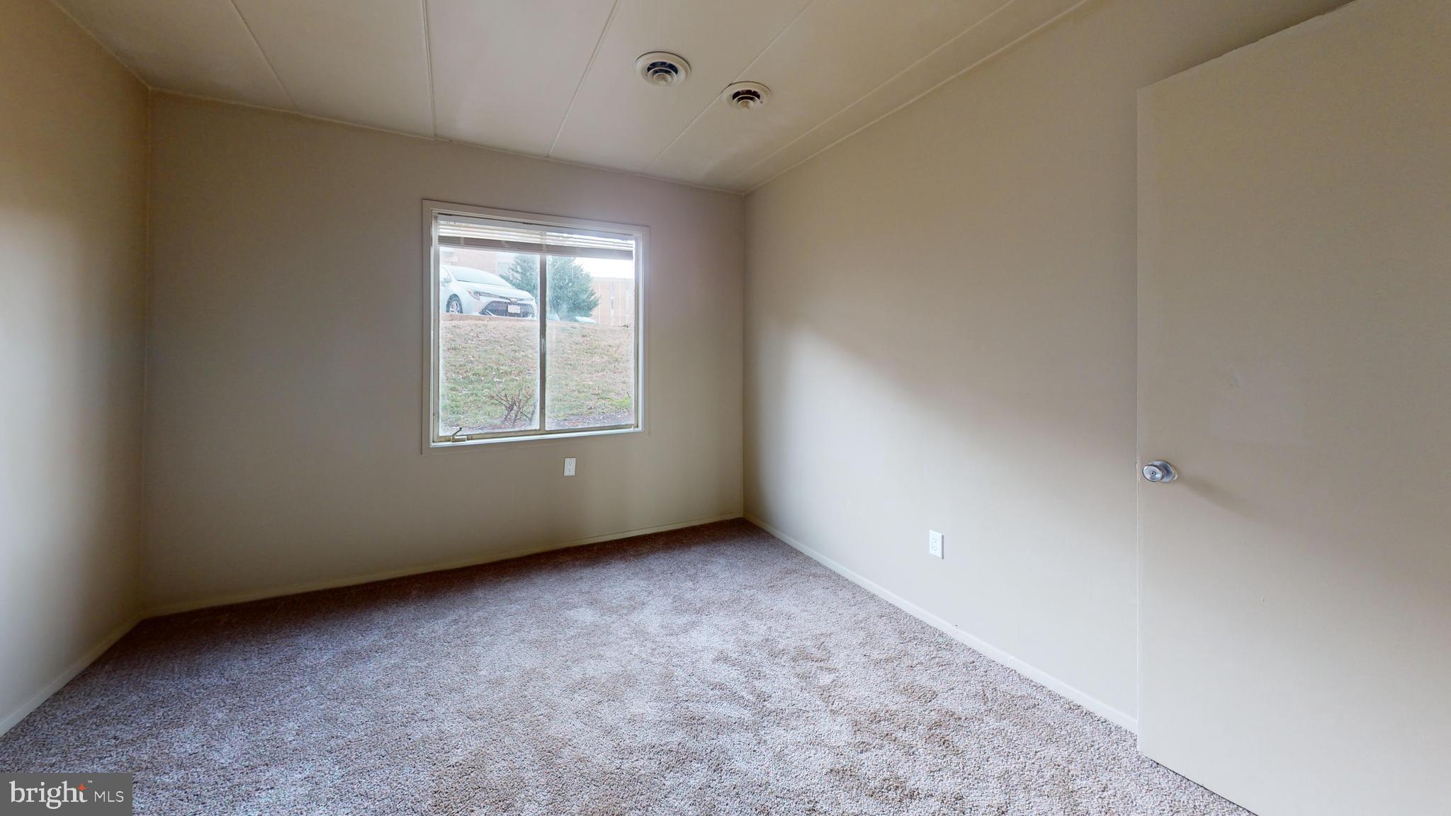 2612 Fort Farnsworth Road, Unit 262 Alexandria, VA 22303 - Photo 15 of 45 an empty room with windows