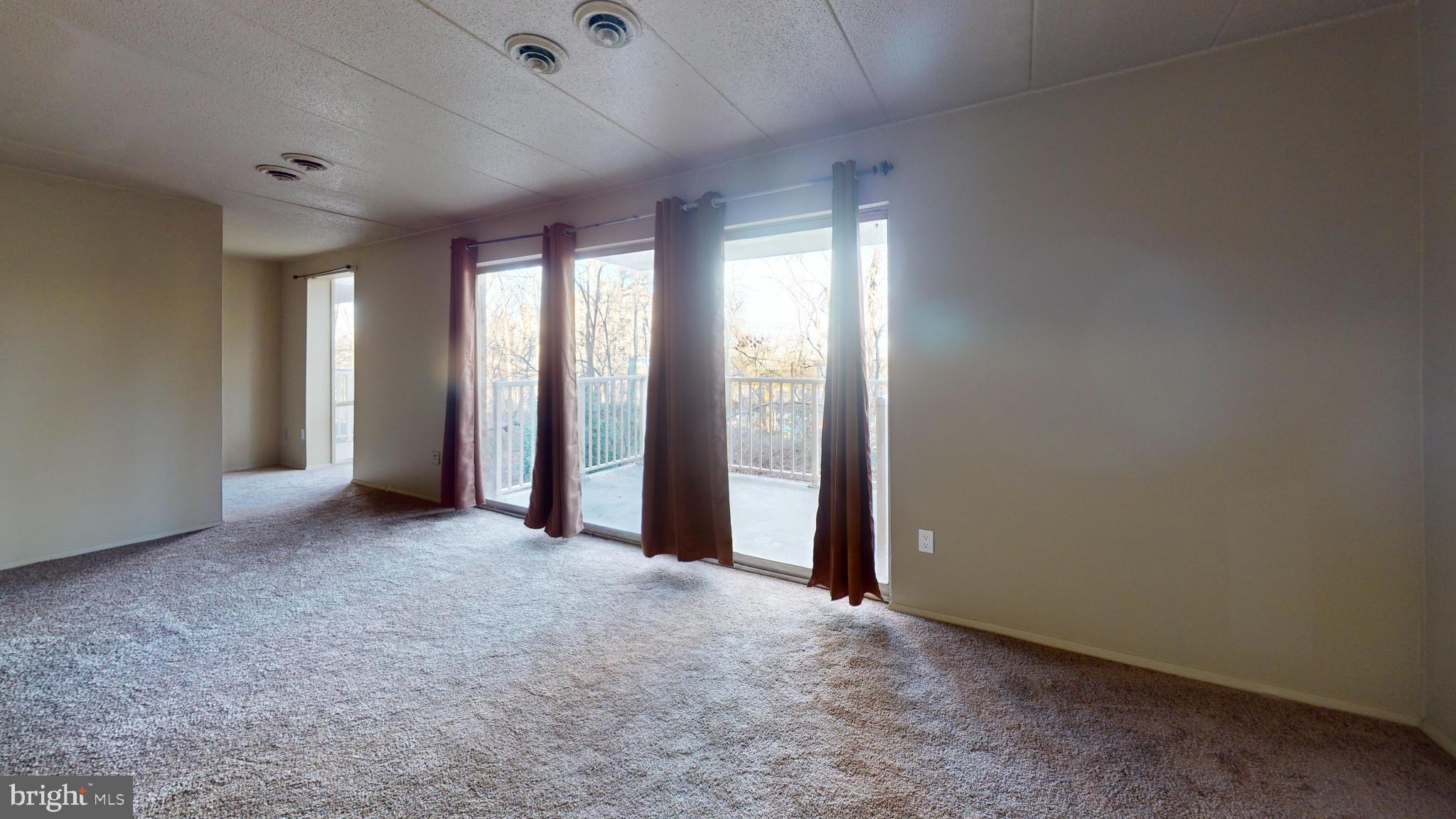 2612 Fort Farnsworth Road, Unit 262 Alexandria, VA 22303 - Photo 23 of 45 an empty room with windows and closet