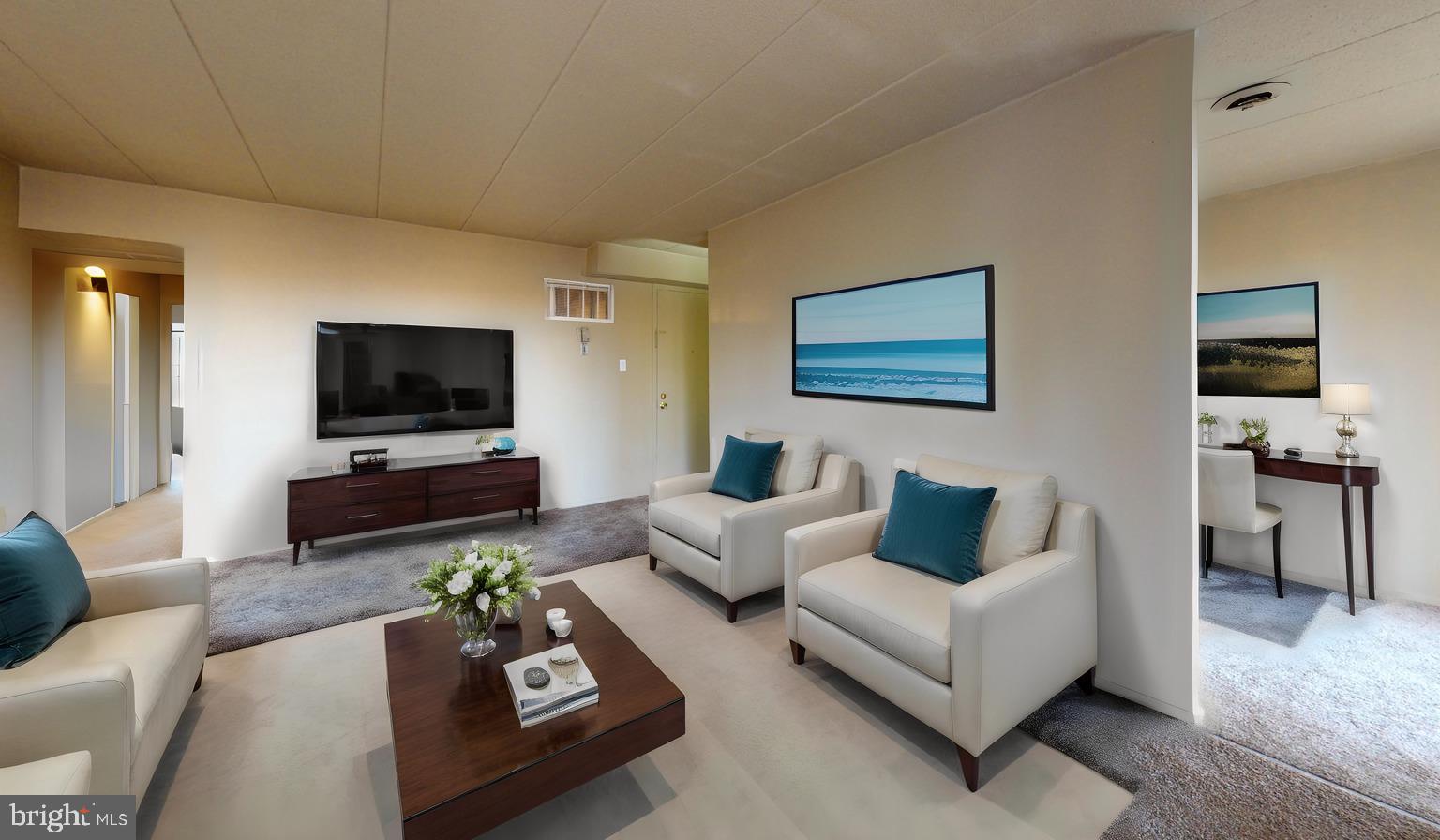 2612 Fort Farnsworth Road, Unit 262 Alexandria, VA 22303 - Photo 3 of 45 a living room with furniture and a flat screen tv