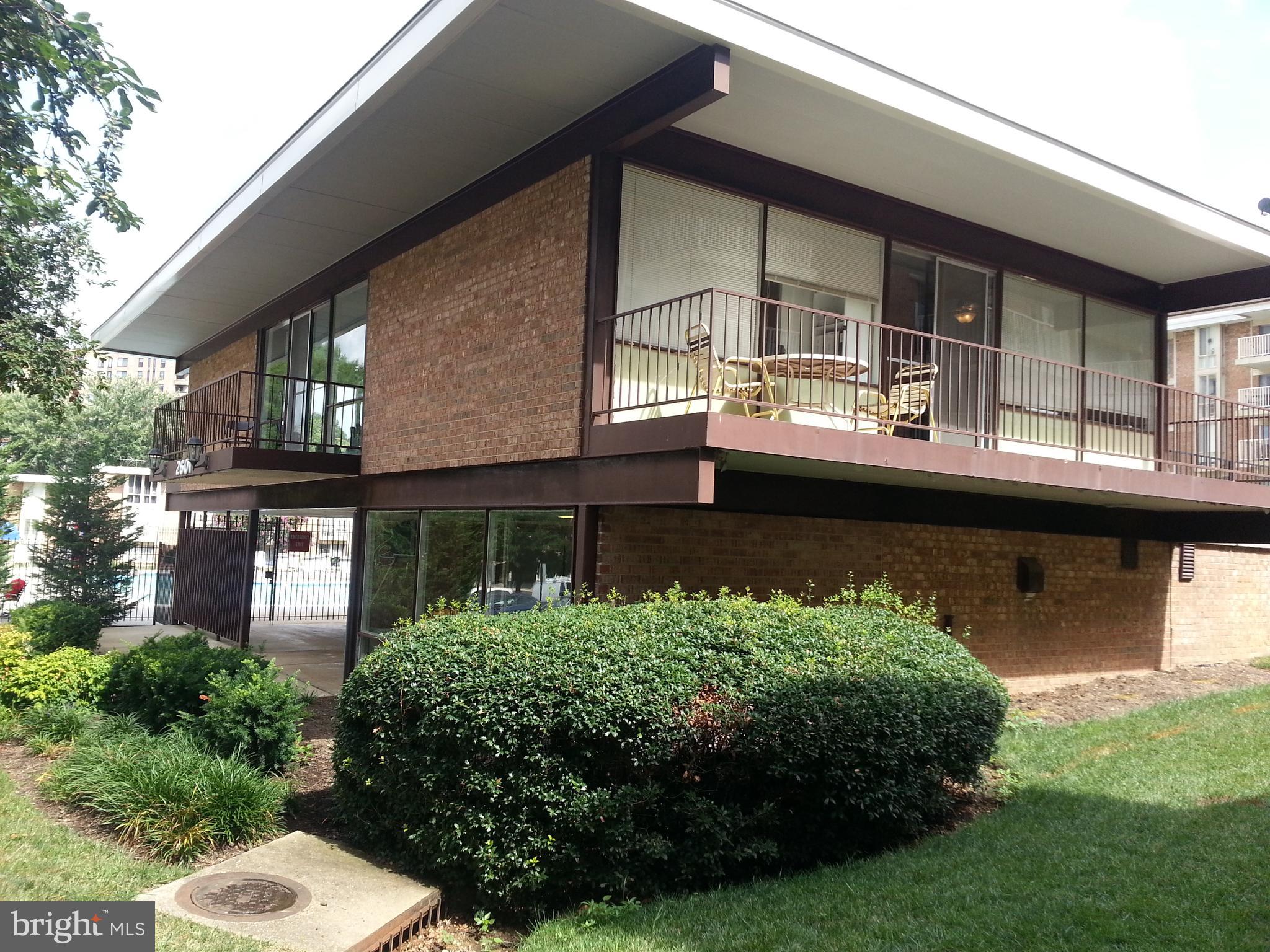2612 Fort Farnsworth Road, Unit 262 Alexandria, VA 22303 - Photo 45 of 45 a view of a house with a garden