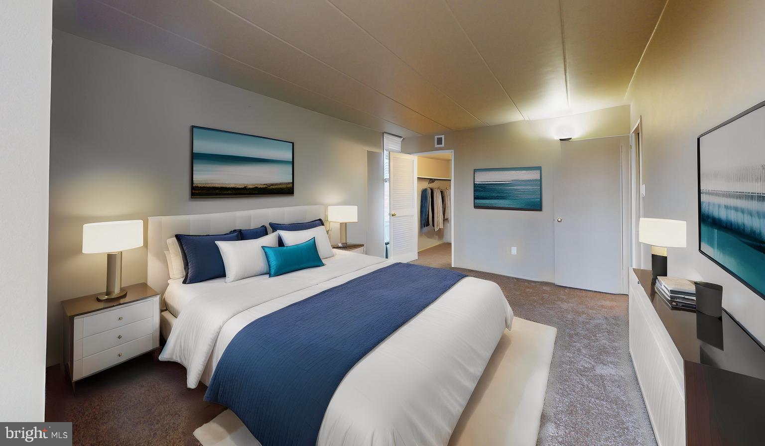 2612 Fort Farnsworth Road, Unit 262 Alexandria, VA 22303 - Photo 6 of 45 a bedroom with a bed and a television