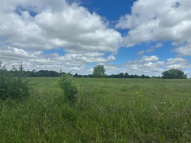 a view of an lake with a yard