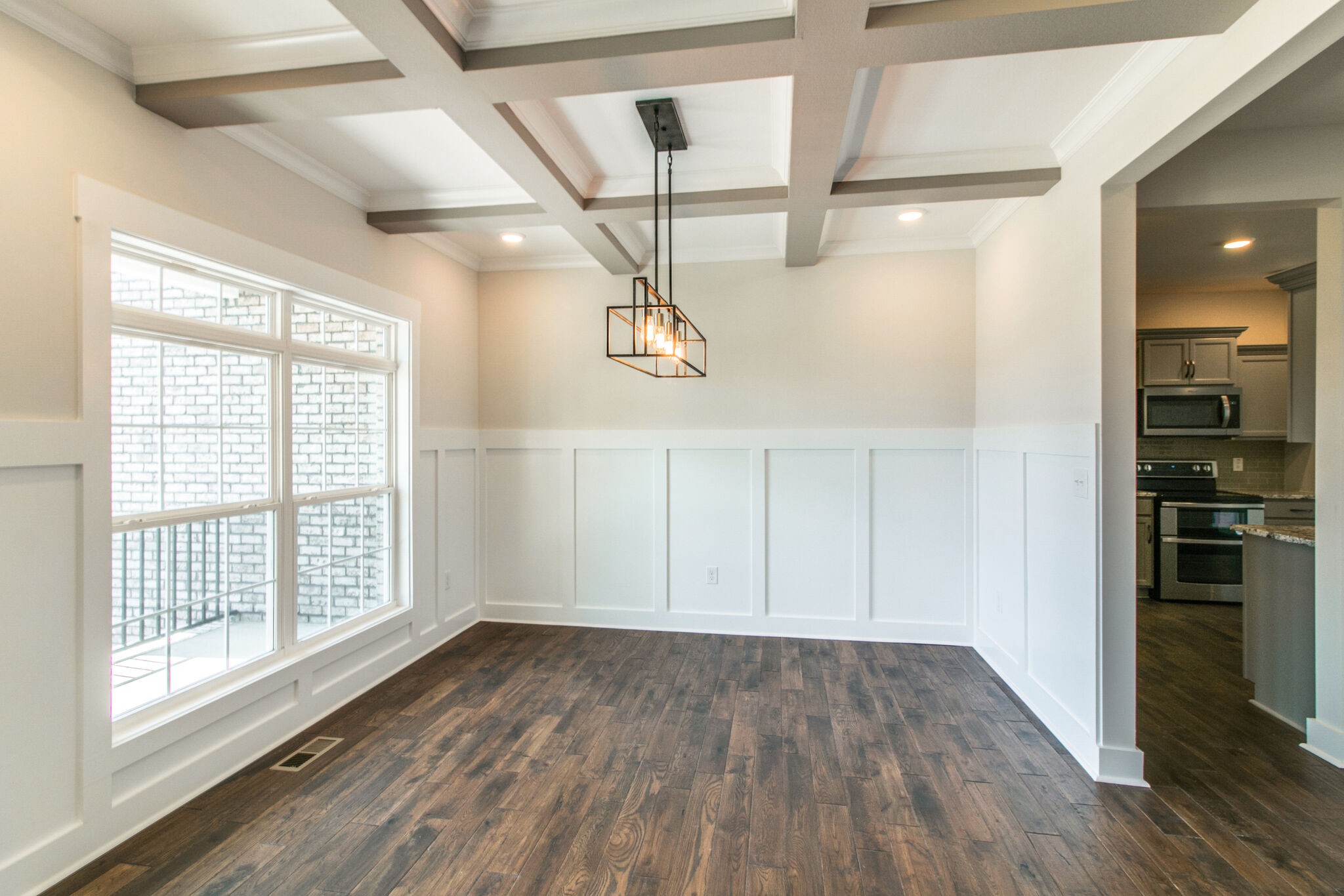 259 Harrowgate Drive Clarksville, TN 37043 - Photo 14 of 39 a view of empty room with wooden floor and fan