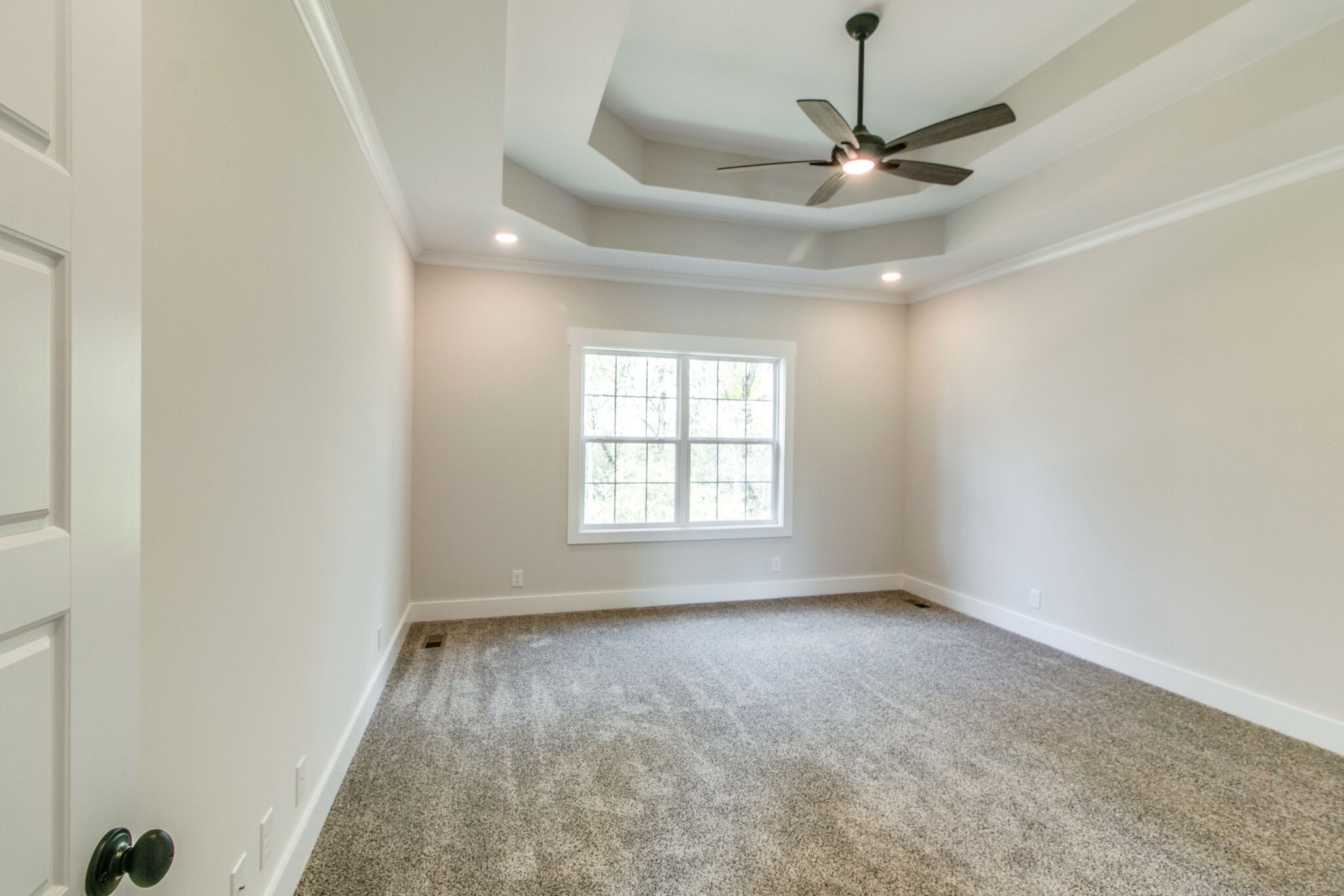 259 Harrowgate Drive Clarksville, TN 37043 - Photo 15 of 39 a view of a livingroom with a window and a ceiling fan
