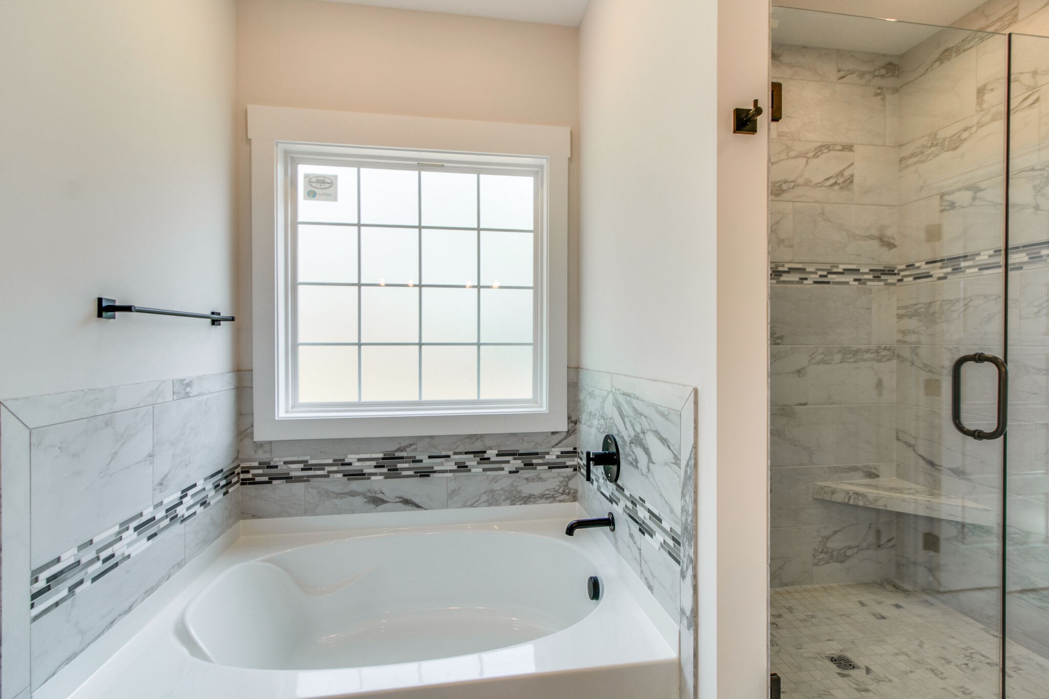 259 Harrowgate Drive Clarksville, TN 37043 - Photo 19 of 39 a bath tub sitting next to a shower