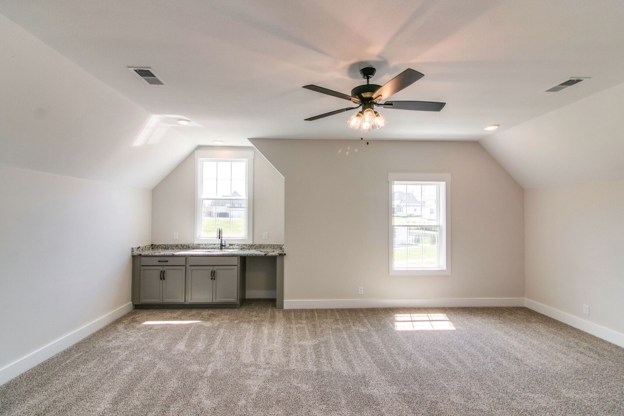 259 Harrowgate Drive Clarksville, TN 37043 - Photo 32 of 39 a view of a livingroom with a chandelier fan and a kitchen view
