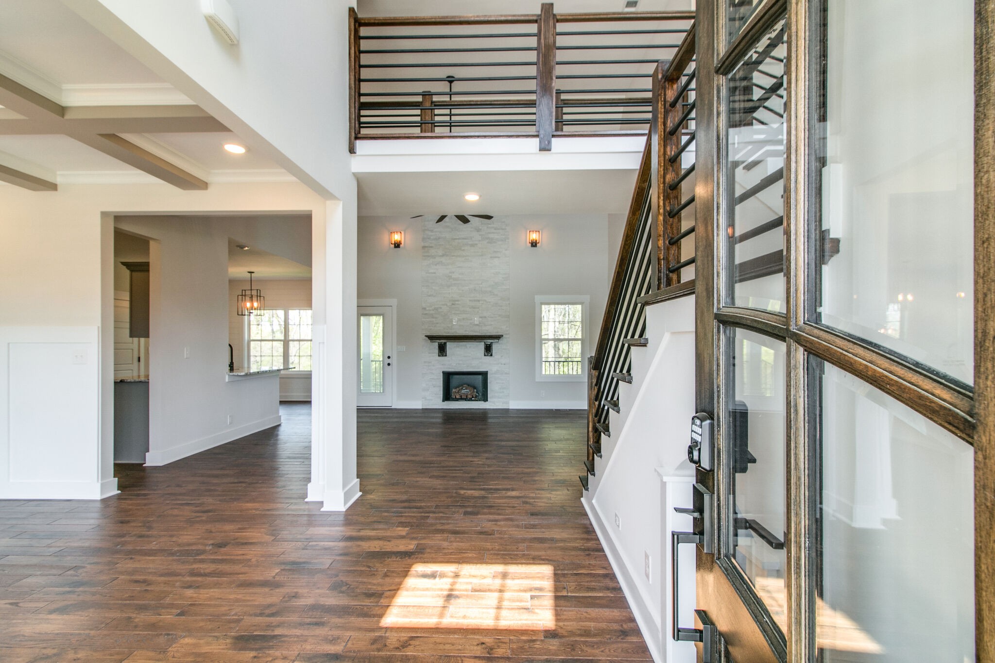 259 Harrowgate Drive Clarksville, TN 37043 - Photo 5 of 39 a view of entryway with wooden floor and a front door