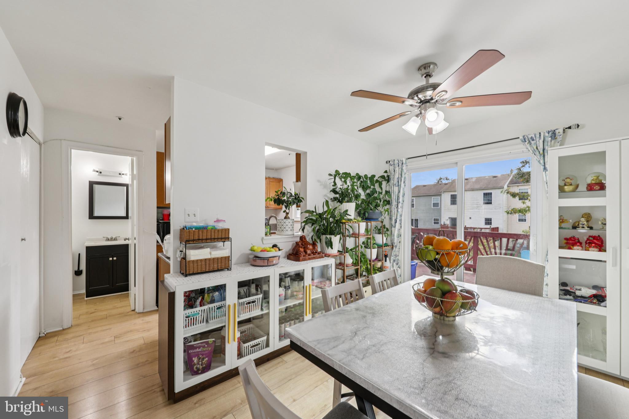 12014 Swallow Falls Court Silver Spring, MD 20904 - Photo 11 of 48 a view of a dining room with furniture and a kitchen
